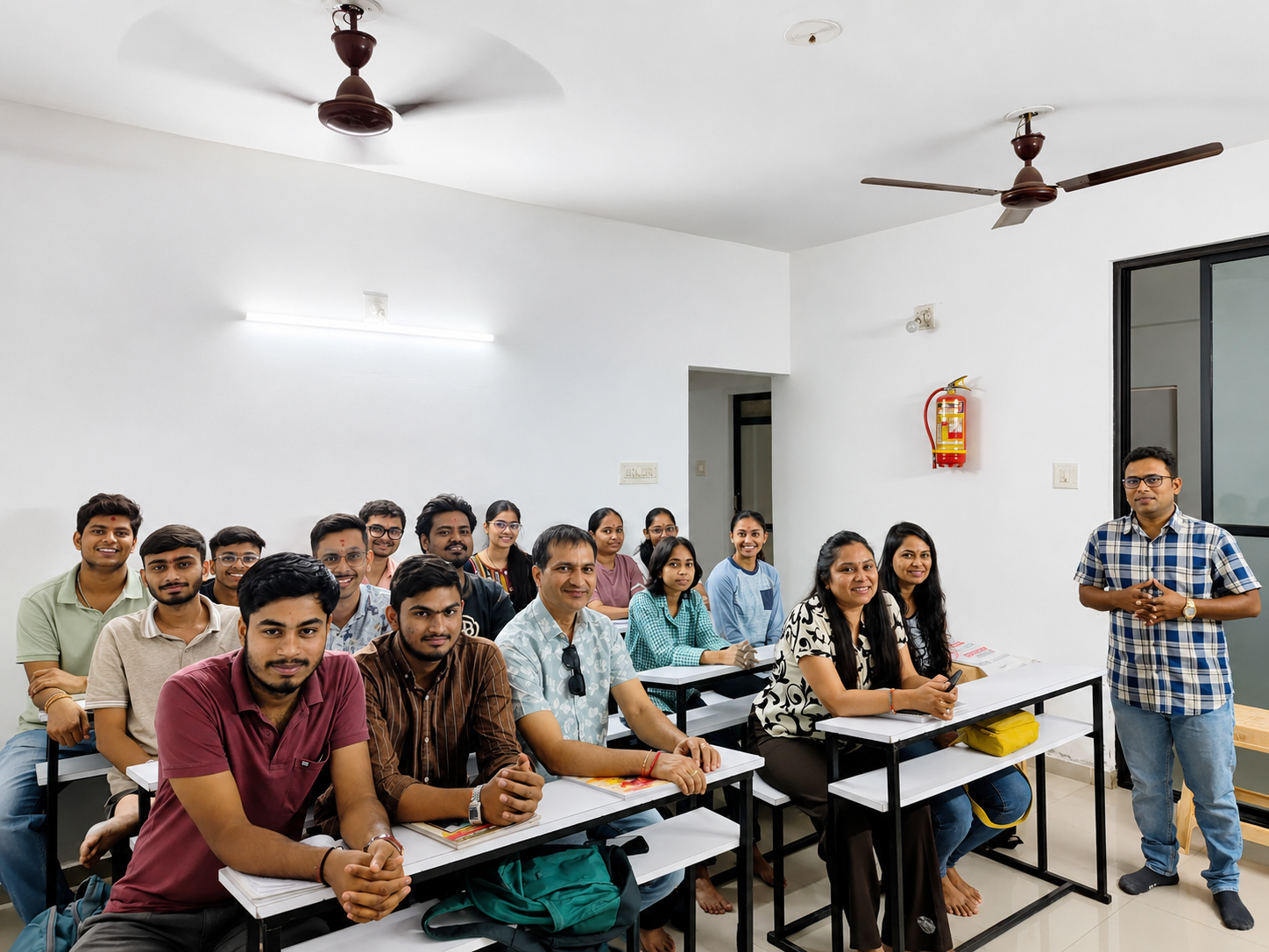 Students learning English in a bright classroom at The English Academy